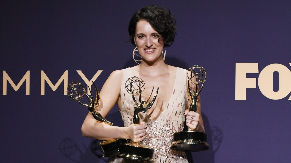 Phoebe Waller-Bridge poses with awards for Outstanding Comedy Series, Outstanding Lead Actress in a Comedy Series, and Outstanding Directing for a Comedy Series in the press room during the 71st Emmy Awards