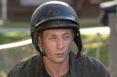 Jeremy Allen White as Lip Gallagher on a motorcycle in Shameless