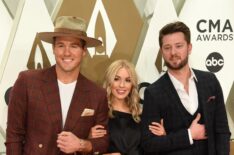 Colton Underwood poses with Cassie Randolph and Adam Doleac at The 53rd Annual CMA Awards