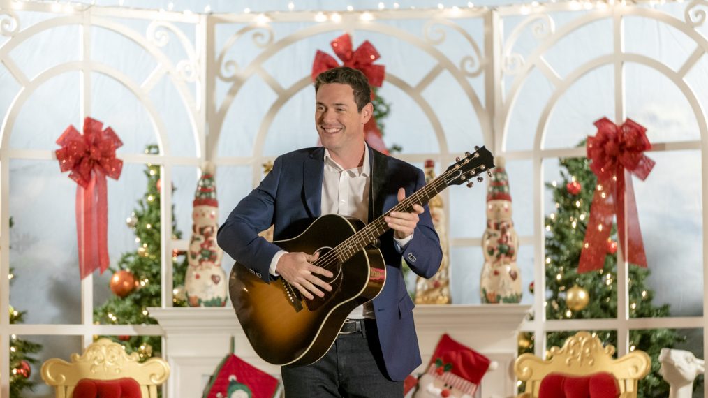 Brendan Hines playing guitar in Our Christmas Love Song