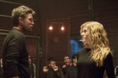 Stephen Amell as Oliver Queen/Green Arrow and Katherine McNamara as Mia in Arrow - 'Prochnost'