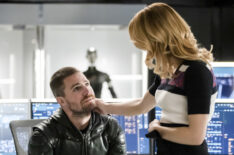 Arrow - Stephen Amell as Oliver Queen/Green Arrow and Emily Bett Rickards as Felicity Smoak - 'Inheritance'