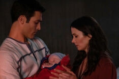 Tyler Hoechlin as Clark Kent/Superman and Elizabeth Tulloch as Lois Lane with baby in Crisis on Infinite Earths: Part One