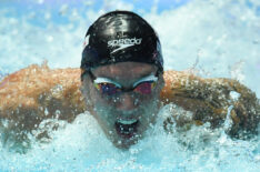 Caeleb Dressel competes and makes a world record in a semi-final of the men's 100m butterfly
