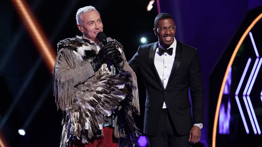 Dr. Drew with host Nick Cannon in The Masked Singer - Eagle