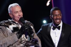 Dr. Drew with host Nick Cannon in The Masked Singer - Eagle