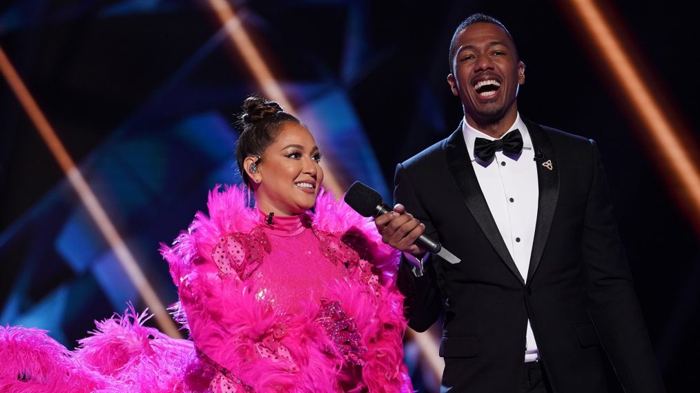 Adrienne Bailon Houghton and Nick Cannon in the two-hour season finale The Masked Singer - Flamingo