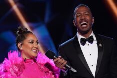 Adrienne Bailon Houghton and Nick Cannon in the two-hour season finale The Masked Singer - Flamingo
