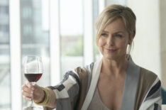 Melora Hardin raising a glass of wine in The Bold Type