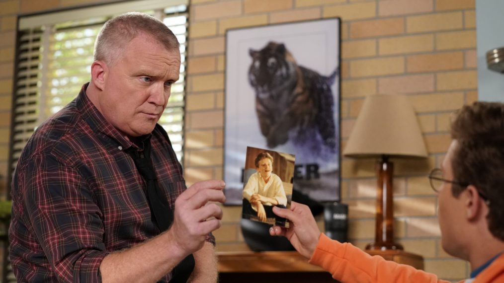 Sean Giambrone holding a picture of a young Anthony Michael Hall in the 'Game Night' episode of The Goldbergs
