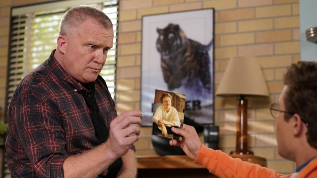Sean Giambrone holding a picture of a young Anthony Michael Hall in the 'Game Night' episode of The Goldbergs