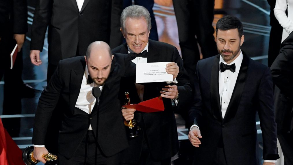 At the Oscars, Travolta and Menzel make light of last year's gaffe