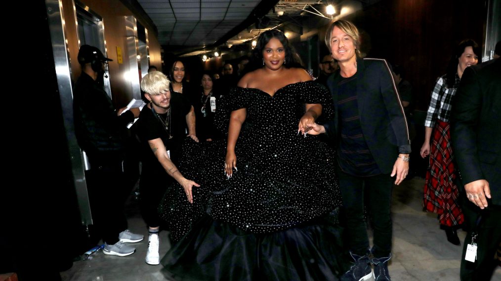 Lizzo and Keith Urban are seen backstage at the Grammy Charities Signings during the 62nd Annual GRAMMY Awards