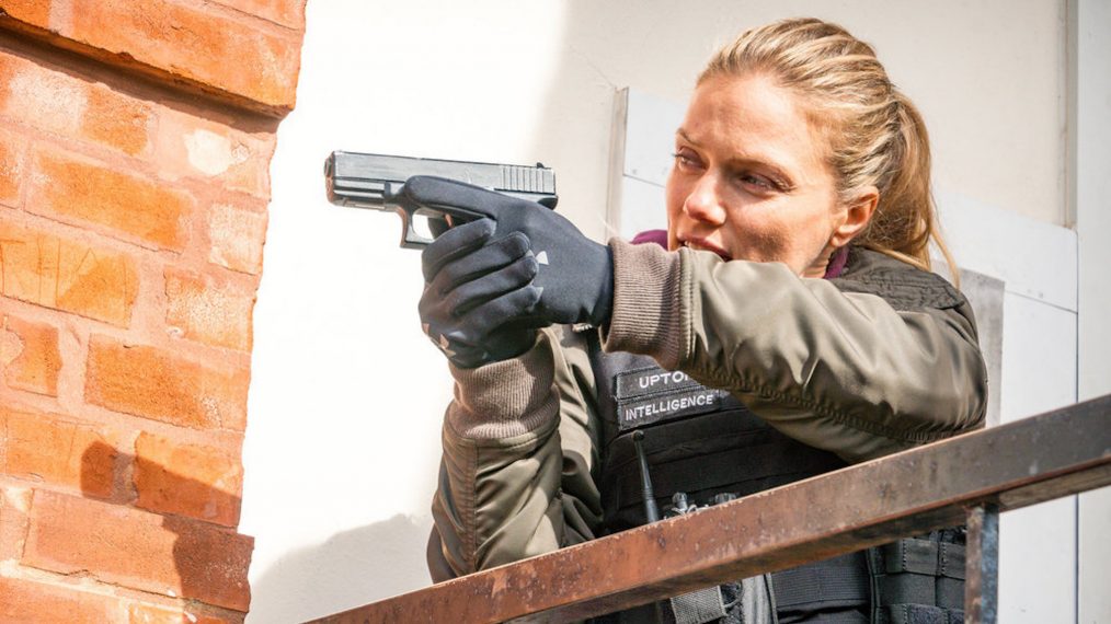 Chicago P.D. - Season 7 - Tracy Spiridakos as Det. Hailey Upton pointing a gun