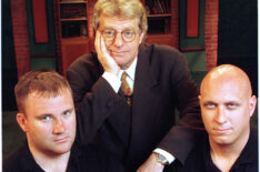 TV talk show host Jerry Springer poses with two of his bodyguards on the set of The Jerry Springer Show