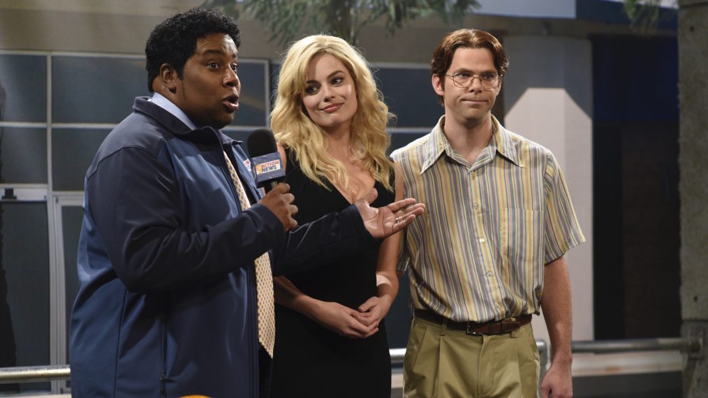 Kenan Thompson as Neil McNabb, Margot Robbie as Alexandra Kennedy Shatt, and Mikey Day as Matt Shatt during the 'Live Report' sketch on Saturday Night Live