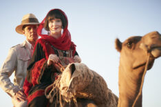 Nathan Page and Essie Davis on a camel in Miss Fisher and the Crypt of Tears