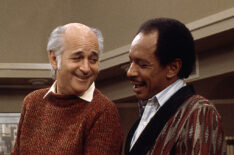 Norman Lear talks with actors Isabel Sanford and Sherman Hemsley on the set of 'The Jeffersons'