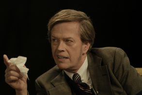 Dylan Baker as Biff Simpson in Hunters - Season 1