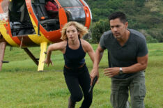 Perdita Weeks and Jay Hernandez running from a helicopter in Magnum P.I.