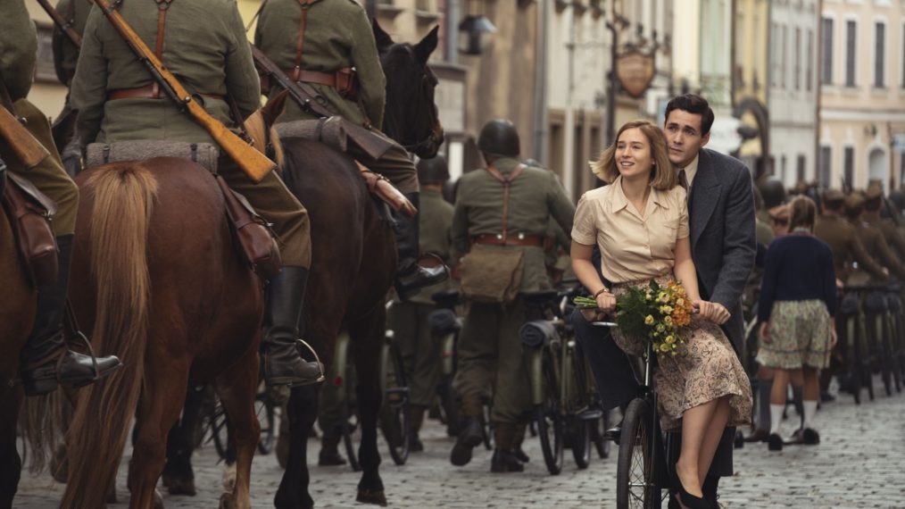 World on Fire - Zofia Wichlacz as Kasia Tomaszeski and Jonah Hauer-King as Harry Chase on a bicycle