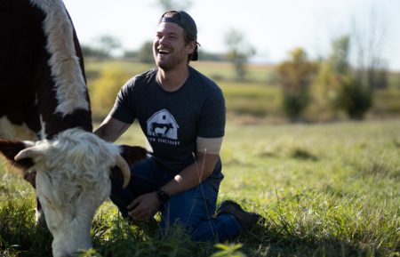 SAVED BY THE BARN DAN MCKERNAN WITH COW