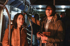 Violett Beane as Cara Bloom and Brandon Micheal Hall as Miles Finer on the subway in God Friended Me