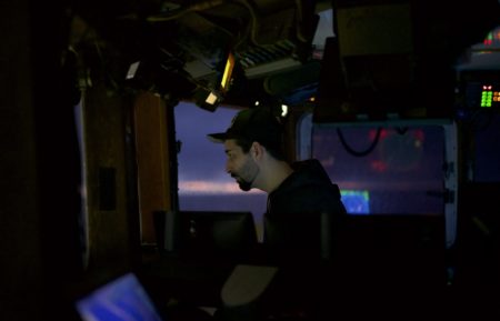 Captain Josh Harris at the helm of the Cornelia Marie