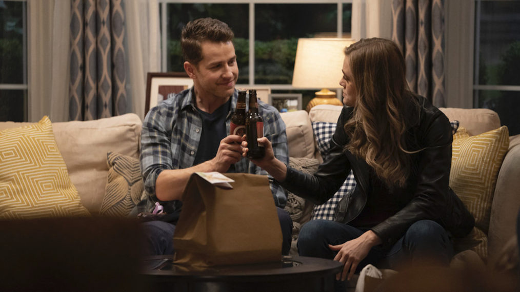 Josh Dallas as Ben Stone and Melissa Roxburgh as Michaela Stone clinking beers in Manifest - Season 2