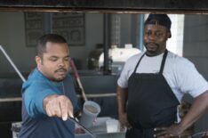 Roger Mooking basting whole hog on Man Fire Food - Cooking Channel