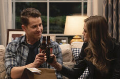 Josh Dallas as Ben Stone and Melissa Roxburgh as Michaela Stone clinking beers in Manifest - Season 2