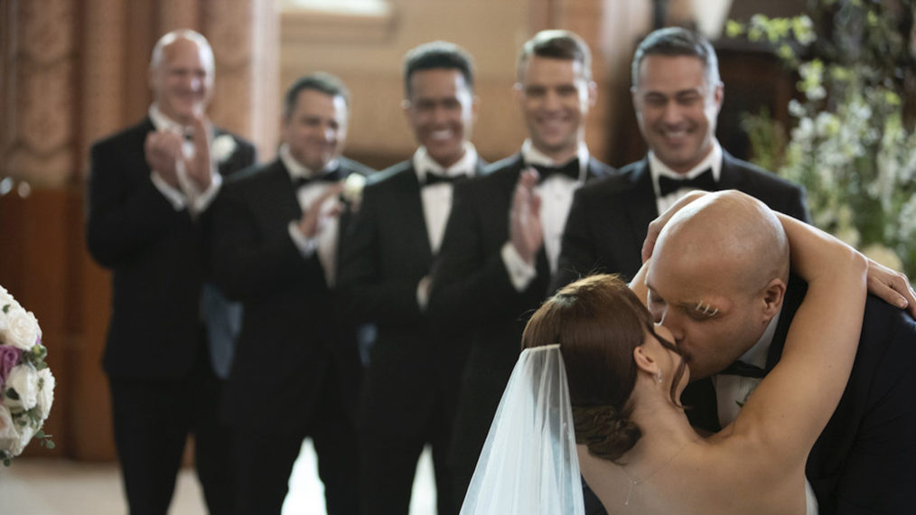 Kristen Gutoskie as Chloe Allen, Joe Minoso as Joe Cruz - Chicago Fire Season 9 Wedding Kiss