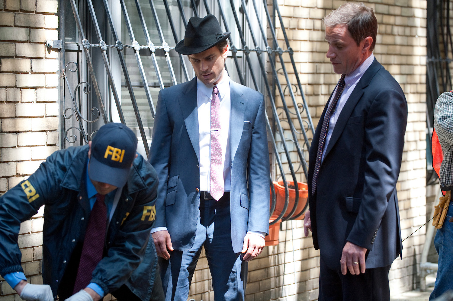 Matt Bomer as Neal Caffrey, Tim DeKay as Peter Burke -- News Photo