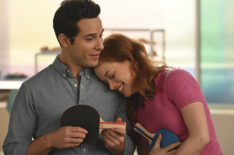 Skylar Astin as Max, Jane Levy as Zoey Clarke holding ping-pong paddles in in Zoey's Extraordinary Playlist - Season 1