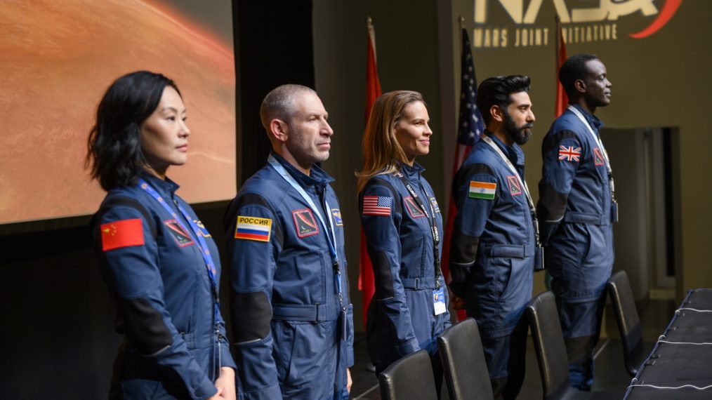 Away cast - Vivian Wu as Lu Wang, Mark Ivanir as Misha Popov, Hilary Swank as Emma Green, Ray Panthaki as Ram Arya, and Ato Essandoh as Dr. Kwesi Weisberg-Abban in Episode 101 of Away. Cr. Diyah Pera/Netflix © 2020