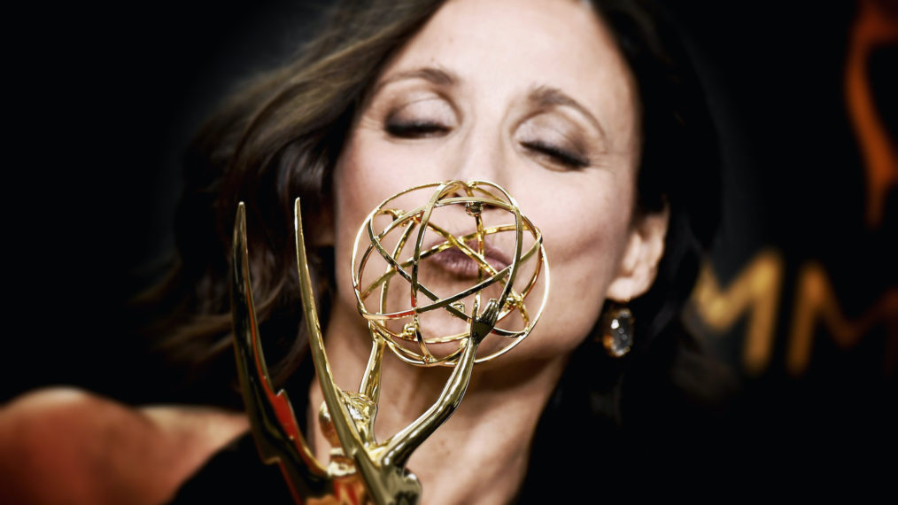 Julia Louis-Dreyfus kisses her Emmy Award