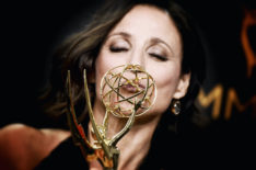 Julia Louis-Dreyfus kisses her Emmy Award