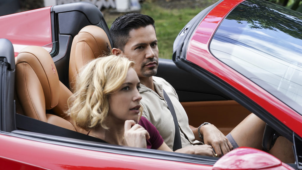 Jay Hernandez as Thomas and Perdita Weeks in Higgins in Magnum PI's red sports car