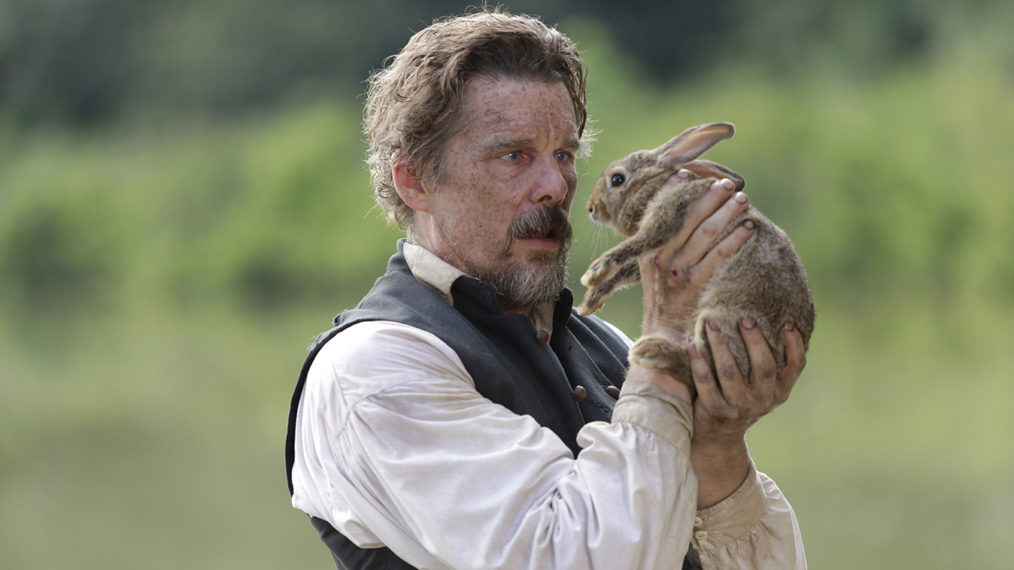 The Good Lord Bird - Ethan Hawke as abolitionist John Brown holding up a rabbit