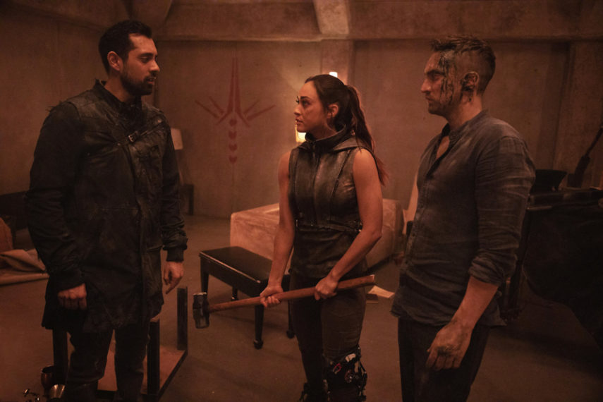 Richard Harmon, Lindsey Morgan, and Sachin Sahel in The 100 - 'The Dying of the Light'