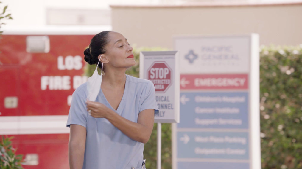 Dr. Rainbow Johnson (Tracee Ellis Ross) exits the hospital after a shift treating Covid-19