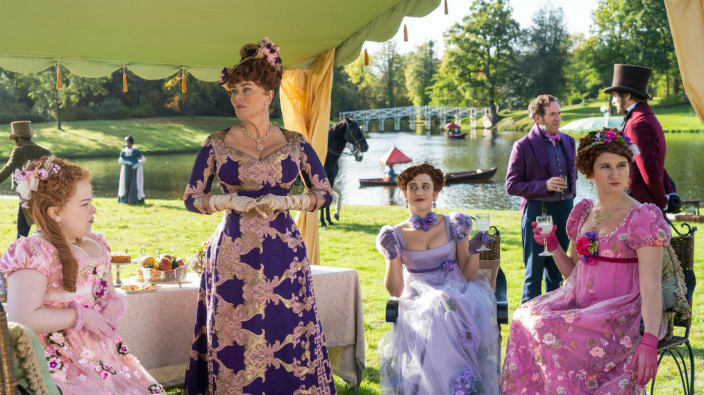 Bridgerton - Nicola Coughlan as Penelope Featherington, Polly Walker as Portia Featherington, Harriet Cains as Phillipa Featherington, Ben Miller as Lord Featherington, and Bessie Carter as Prudence Featherington