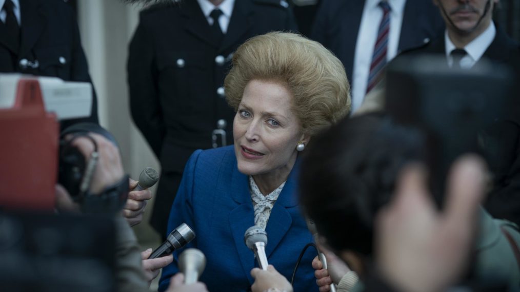 Margaret Thatcher (Gillian Anderson) takes questions from reporters
