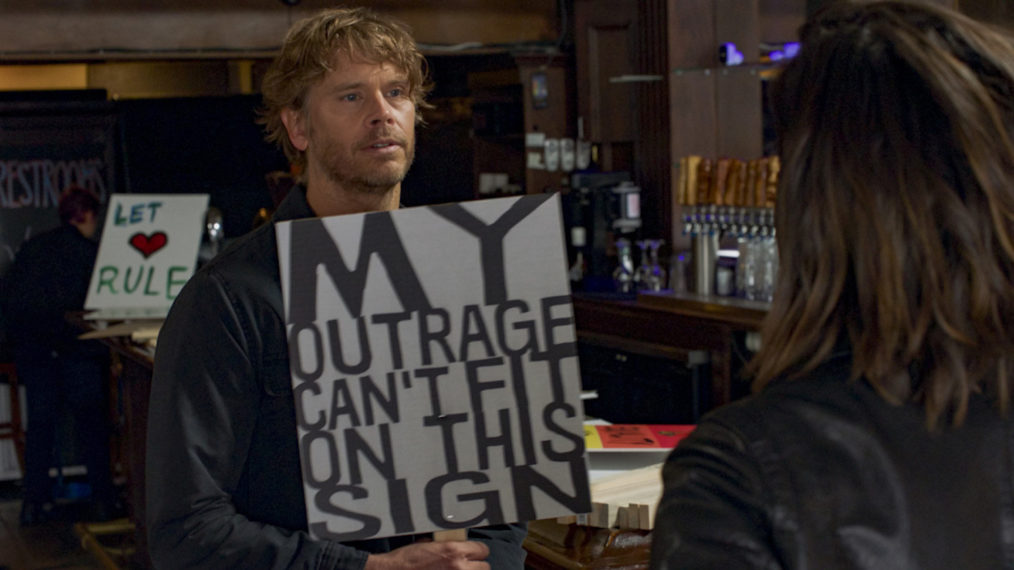 Eric Christian Olsen as Deeks says his outage can't fit on a sign on a sign - NCIS Los Angeles Season 12, Episode 10