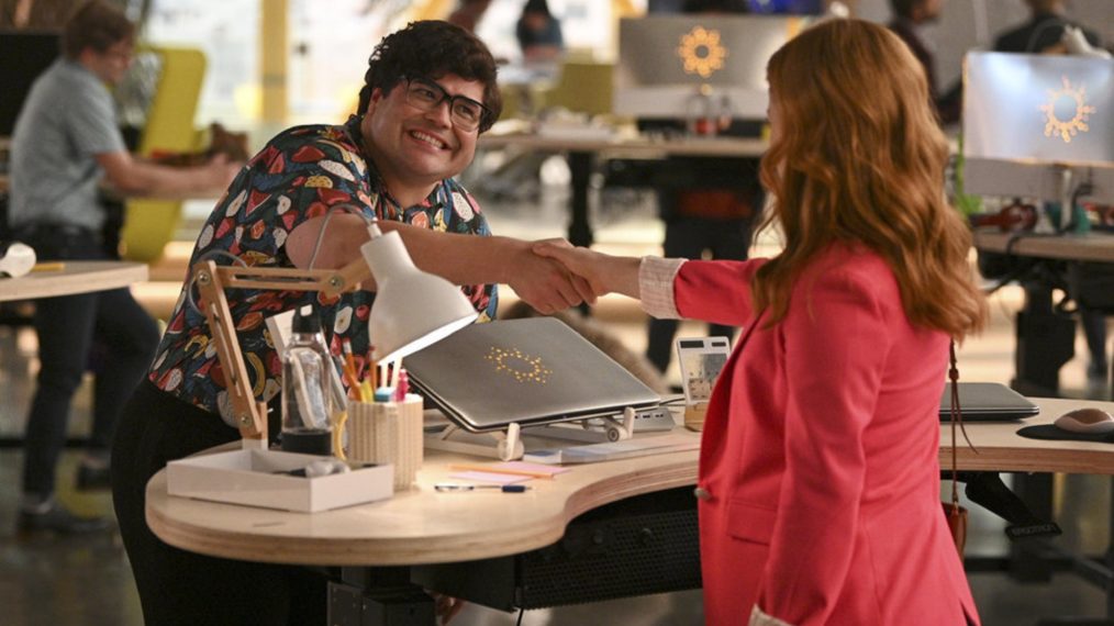 Harvey Guillen as George shaking hands with Jane Levy as Zoey Clarke in Zoey's Extraordinary Playlist