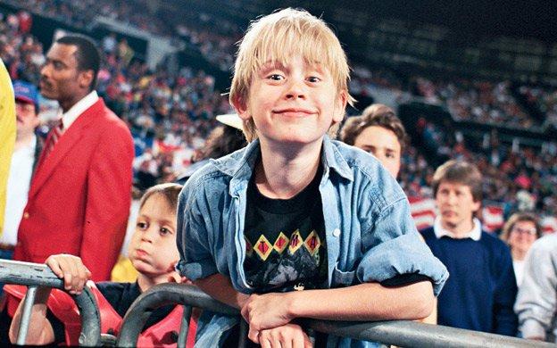 Macaulay Culkin attending a pro wrestling show