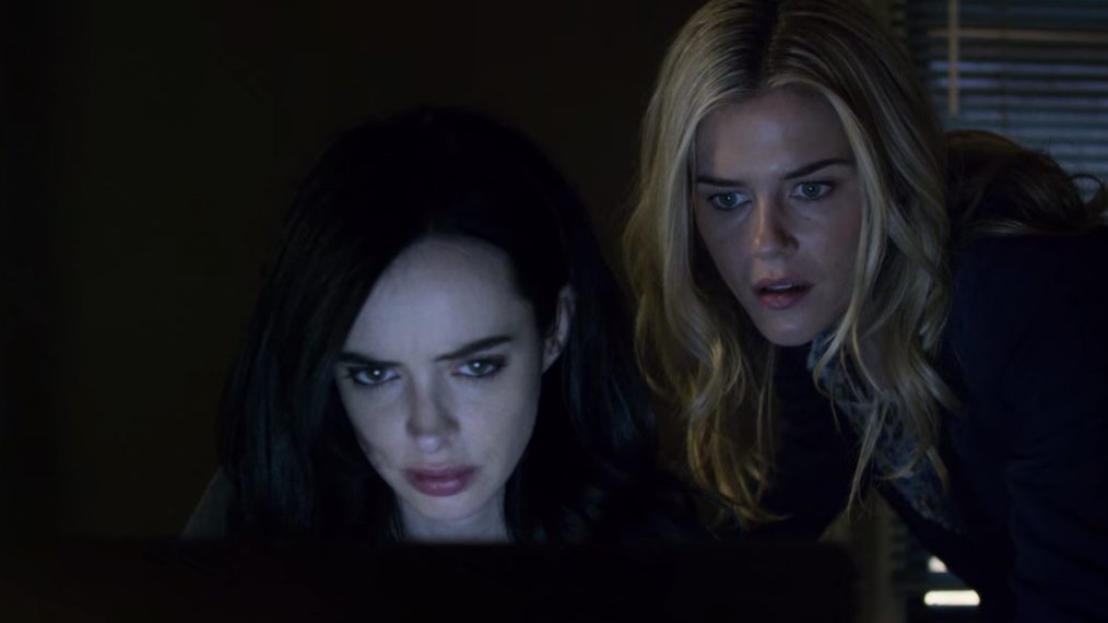 Krysten Ritter as Jessica Jones and Rachael Taylor as Trish Walker in Jessica Jones