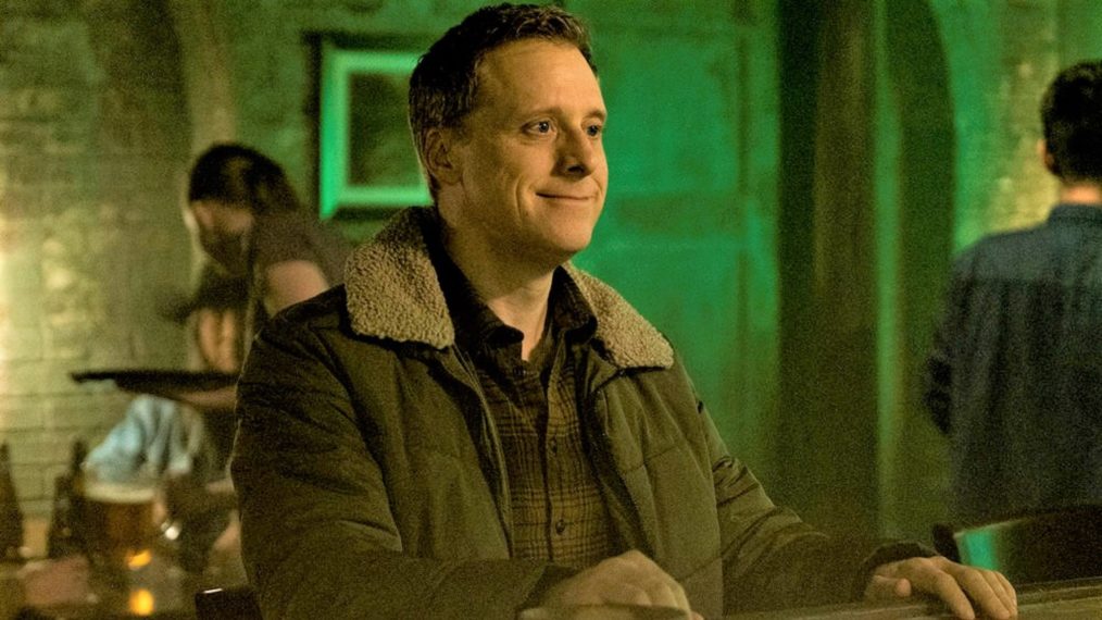 Alan Tudyk at the bar in Resident Alien - Season 1