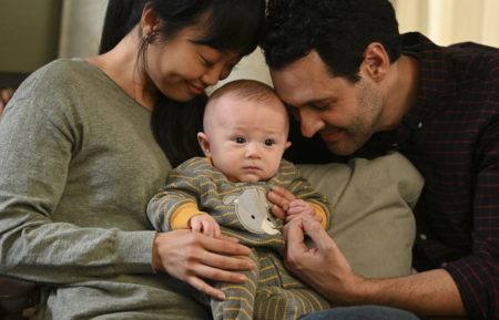 Alice Lee as Emily and Andrew Leeds as David with their baby in Zoey's Extraordinary Playlist - Season 2
