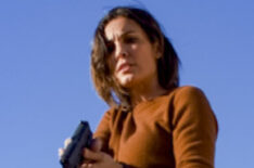 Daniela Ruah as Kensi Blye points a gun in NCIS Los Angeles - Season 12 Episode 15 - 'Imposter Syndrome'